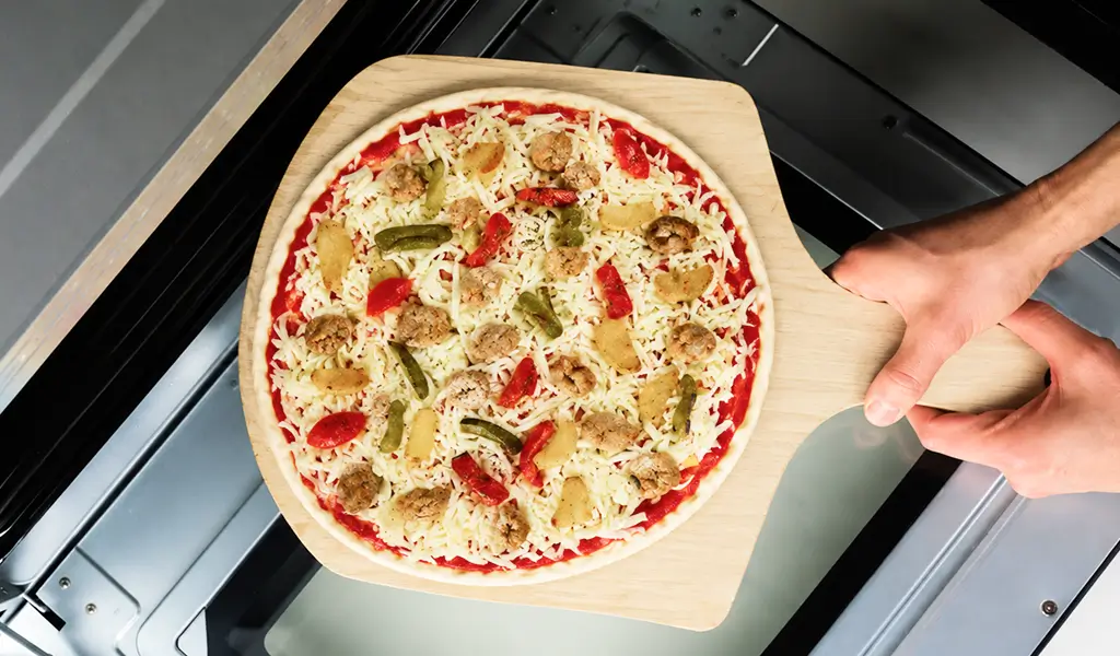 eatons sheboygan italian sausage pizza put in oven